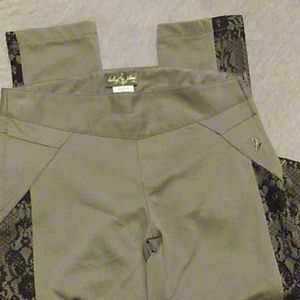Beautiful pair of Baby Phat leggings. Longer lengt